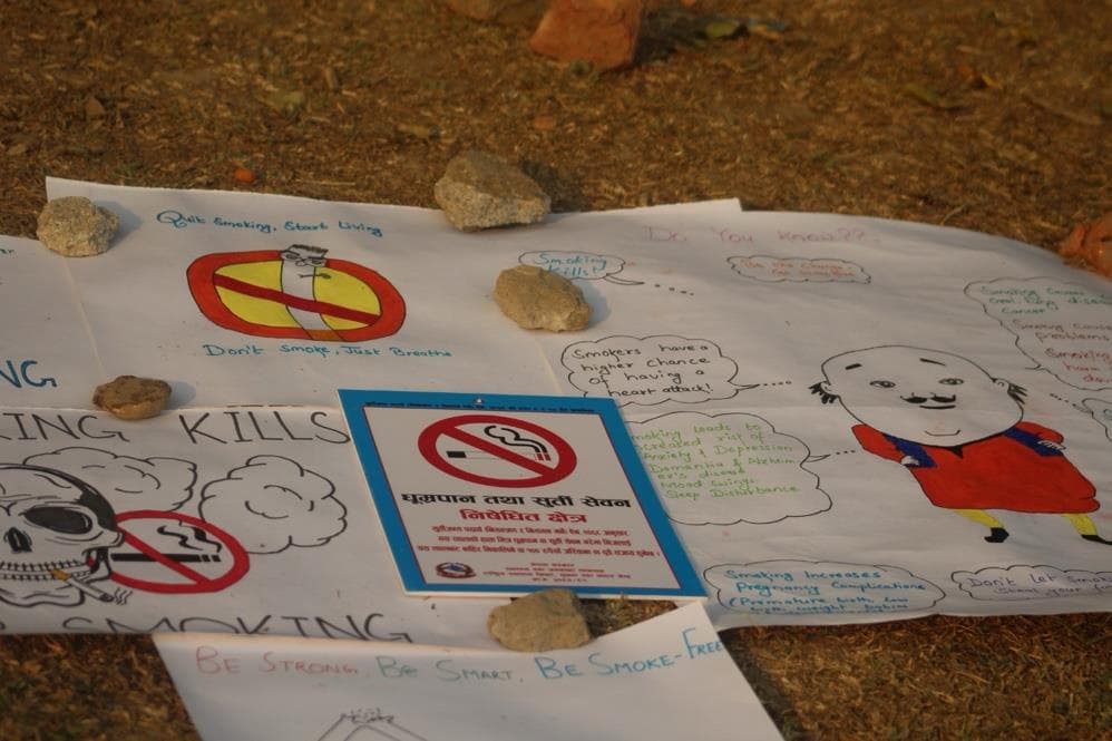 Youth-created anti-tobacco awareness posters at Smoke-Free Tilottama campaign — 'Smoking Kills', 'Be Smoke Free'